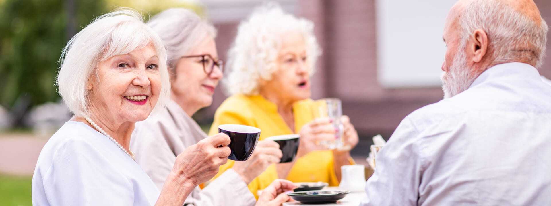 group of seniors enjoying coffee